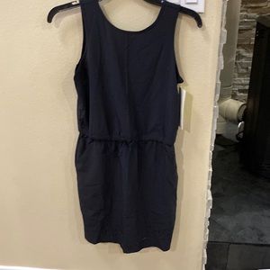 New with tags. Girls Target brand All in Motion dress size L or 10-12.